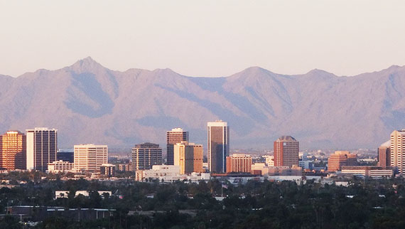 city of phoenix skyline with mountains in the background