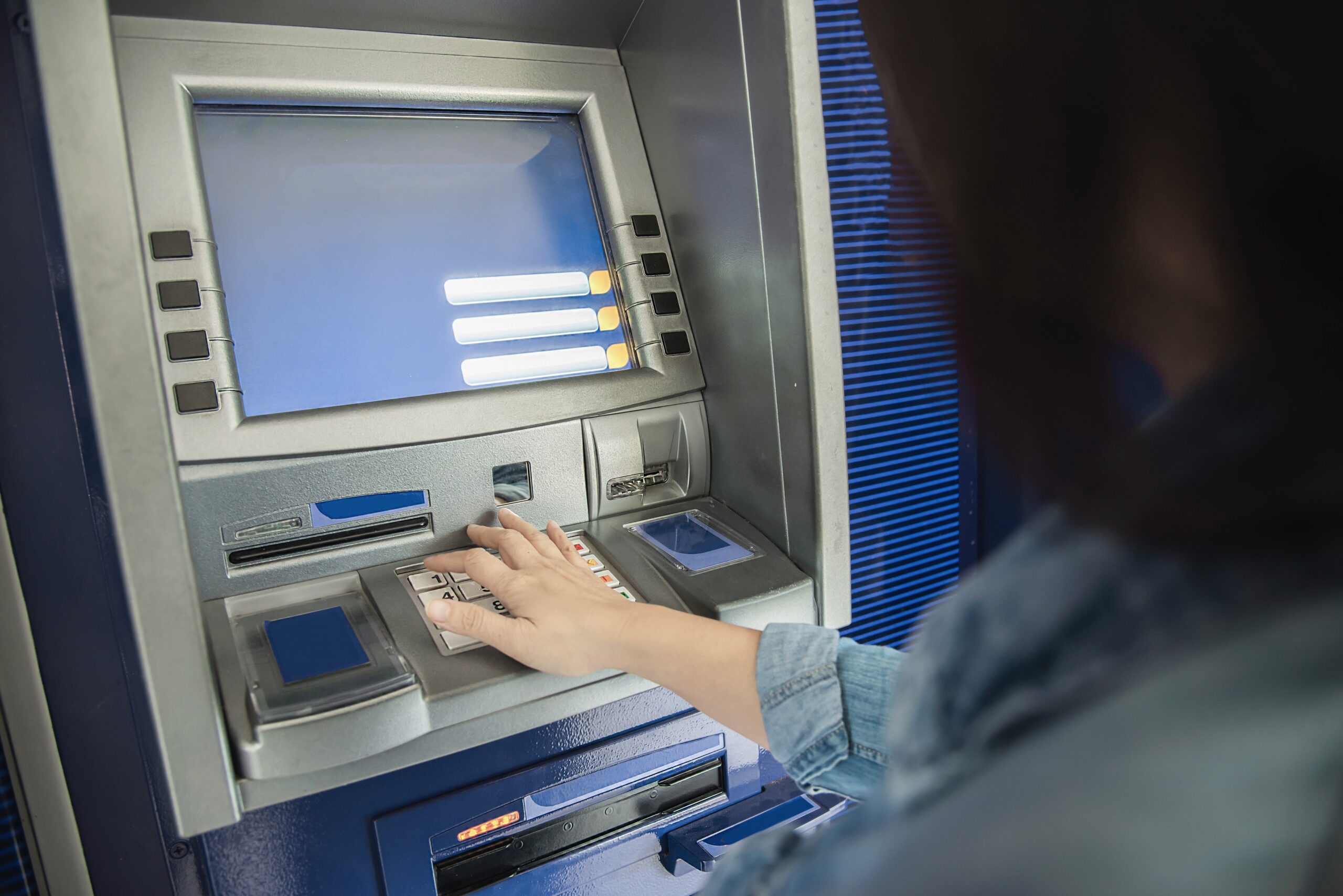 customer at a bank atm