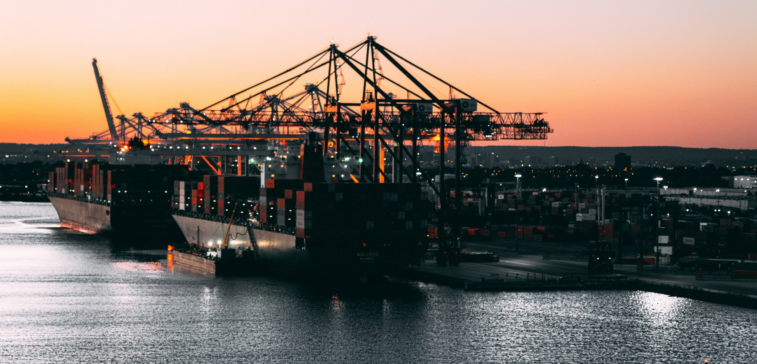 evening view of ships docked at a port